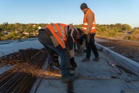 Repair work on a bridge damaged during the war in the Kharkiv region