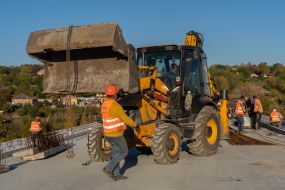 Repair work on a bridge damaged during the war in the Kharkiv region