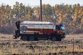 A mine clearing machine works in a field
