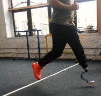 A veteran runs in a new prosthesis, testing it, in the office of the U+system rehabilitation center in Kyiv