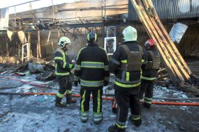 Fire extinguishing after drone debris falls in Solomianskyi district of Kyiv