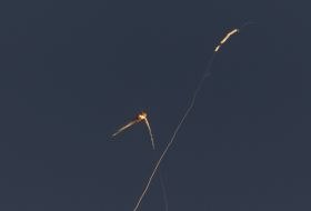 Air defense forces shoot down missiles in the sky over Kyiv