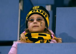 Girl cheerleader in the stands