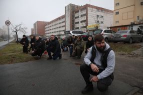 Men accompany Senior Lieutenant Pavlo Vedybida to his final journey