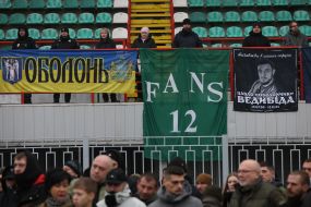 Банер з фотографією старшого лейтенанта Павла Ведибіди на трибуні