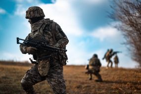 Military personnel train in covert movement skills