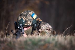 Military personnel train in covert movement skills