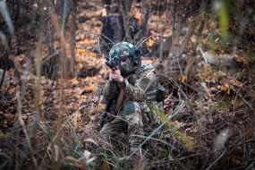 Military personnel train in covert movement skills