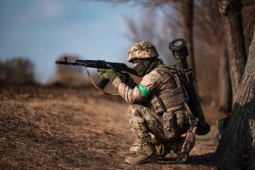 Military personnel train in covert movement skills