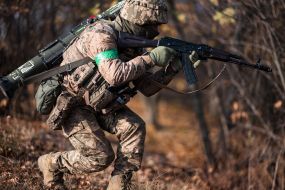 Military personnel train in covert movement skills