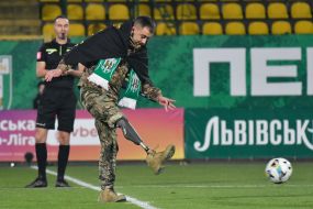 Ukrainian Armed Forces serviceman Oleg Slyvar performs the first symbolic strike