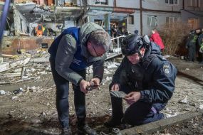 Investigators are collecting evidence of crimes committed by Russian occupiers next to a residential building in Kharkiv destroyed by a drone strike