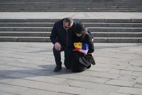 Parents Marcin Antosiak and Angelika Kuza say goodbye to their son