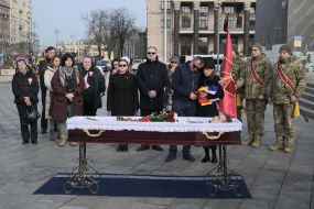 Parents Marcin Antosiak and Angelika Kuza say goodbye to their son
