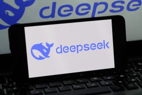 The logo of the artificial intelligence service DeepSeek on a mobile phone screen