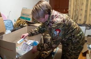 A battalion paramedic of the 13th brigade of the NSU "Charter" collects medicines for the evacuation of the wounded