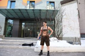 Topless FEMEN activist near the German Embassy in Kyiv
