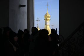 Participants in the "Bell of Memory and Hope: 11 Years of War" ceremony