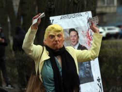 Activist wearing a Donald Trump mask