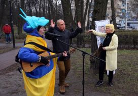 Activists dressed as Donald Trump, Vladimir Putin and the Statue of Liberty