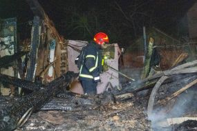 A rescuer during the elimination of the consequences of the arrival of one of the Russian Geran-2 strike drones
