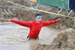 Participant of the large charity obstacle race Kordon race 2025