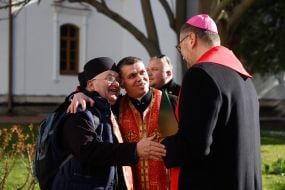 Visvaldas Kulbokas greets the priests