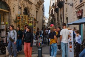 Tourists in the historic center of Syracuse