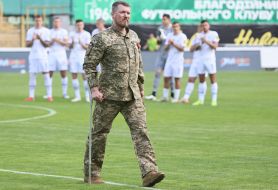 Soldier on the football field
