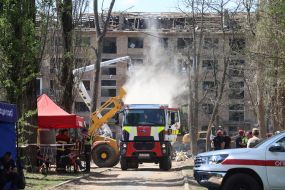 Emergency repair work near the house destroyed by a Russian missile