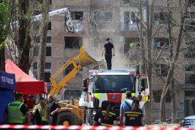Emergency repair work near the house destroyed by a Russian missile