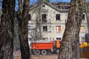 Emergency repair work near the house destroyed by a Russian missile