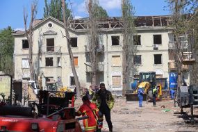 Emergency repair work near the house destroyed by a Russian missile