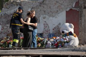 People brought flowers and toys to a house destroyed by a Russian missile