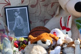 People brought flowers and toys to a house destroyed by a Russian missile