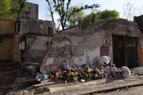 People brought flowers and toys to a house destroyed by a Russian missile
