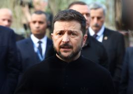 Volodymyr Zelenskyy near a house destroyed by a Russian missile in the Svyatoshynskyi district