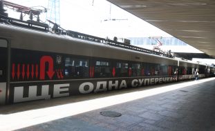 Installation on the carriages of the Intercity train by American artist Barbara Kruger at the Central Station in Kyiv