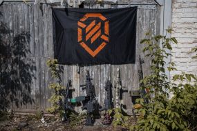 Weapons near the emblem of the 3rd separate assault brigade