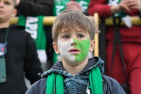 A boy fan with the colors of FC Karpaty (Lviv) on his face
