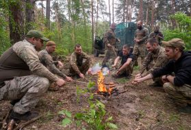 Soldiers resting after completing tasks