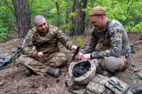 Soldiers resting after completing tasks