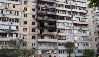 The charred facade of a residential building after being hit by a Russian drone "Geran-2" in the Obolonskyi district of Kyiv