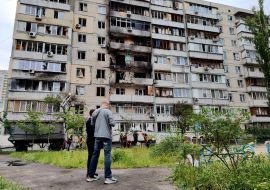 The charred facade of a residential building after being hit by a Russian drone "Geran-2" in the Obolonskyi district of Kyiv