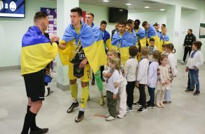 Referee and football players