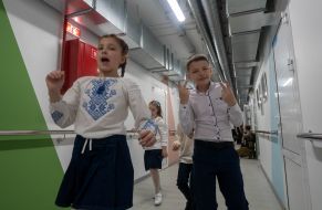 Schoolchildren during the Last Bell Festival in one of the underground educational institutions in Kharkiv