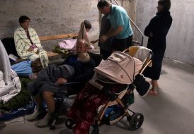 People take shelter in the dormitory of the National Academy of Sciences (now the Kyiv Aviation Institute) during a massive attack in Kyiv