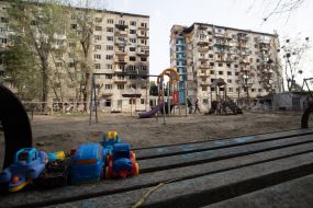A destroyed entrance to a residential building as a result of a direct missile hit in the Solomianskyi district of Kyiv