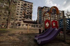 A destroyed entrance to a residential building as a result of a direct missile hit in the Solomianskyi district of Kyiv