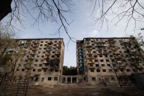 A destroyed entrance to a residential building as a result of a direct missile hit in the Solomianskyi district of Kyiv